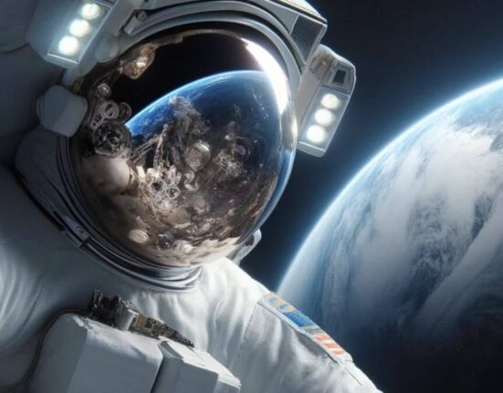 An astronaut floating in the vast expanse of space with Earth visible in the background, surrounded by stars.