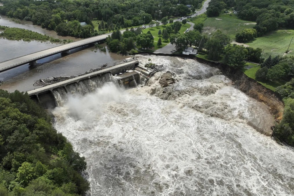 Pipeline damaged by water flow after dam failure.